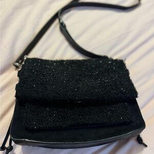 Stuart Weitzman new without tag leather sling bag